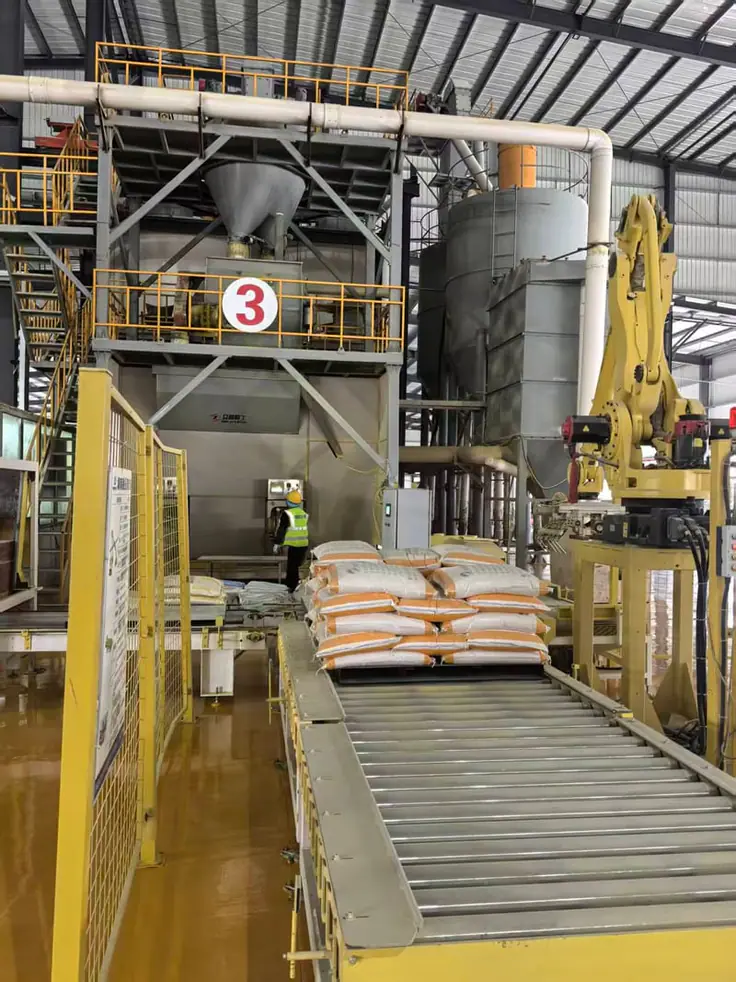 Automated bagging station with a robot palletizer on production line 3